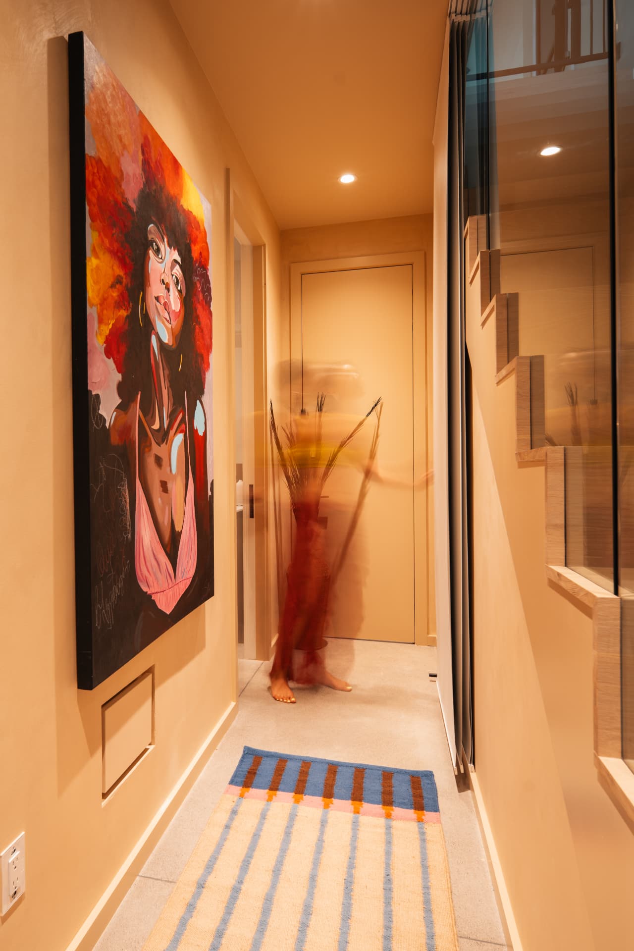 A painting by Saje Mistry installed in a private residence